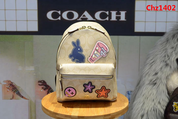 COACH蔻馳 專櫃原單」 配頭層牛皮 20909新款 徽章/塗鴉迷你雙肩包  Chz1402