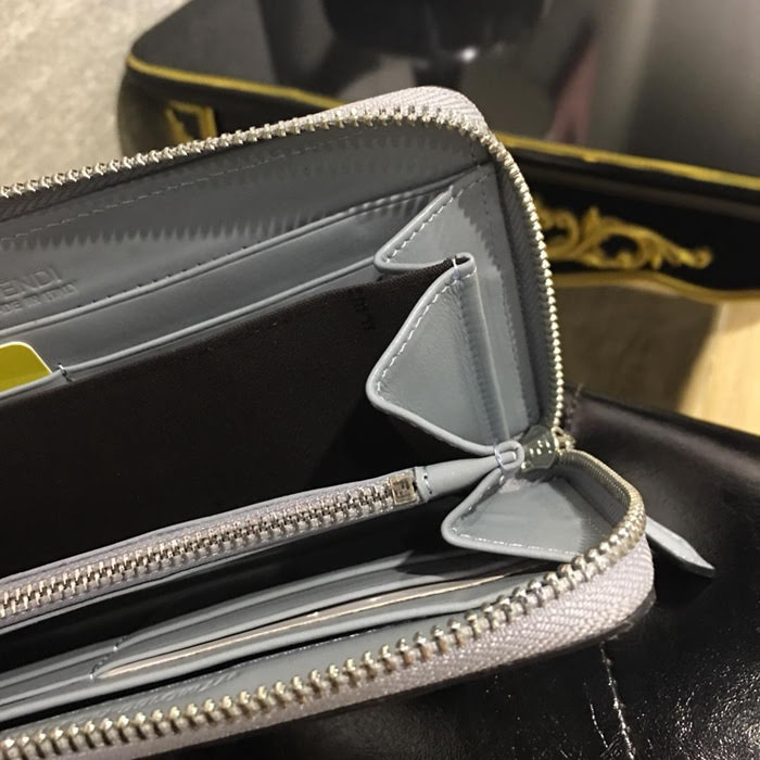 FENDI芬迪 小牛皮 手工縫製 多卡位 小怪獸潮人錢包  fd1159