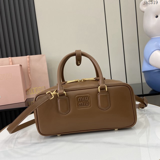 miumiu專櫃繆繆最新款Arcadie牛皮革中號保齡球手提包斜挎包 jh2319型號：5BB148