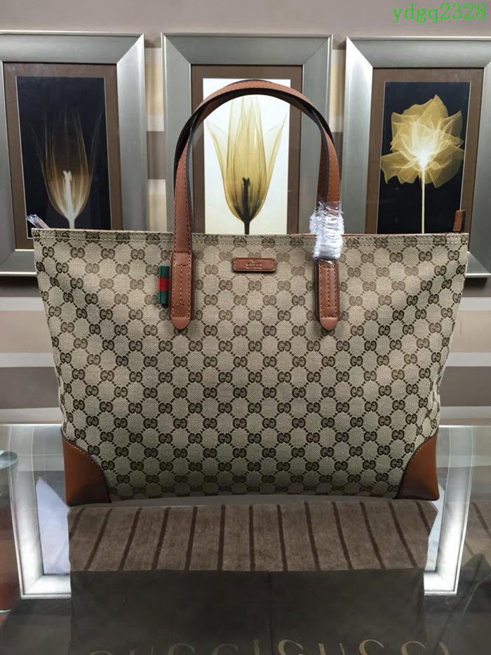 GUCCI 古馳男包 新款 308928 咖色 GUCCI中性 經典圖案 時尚手提包