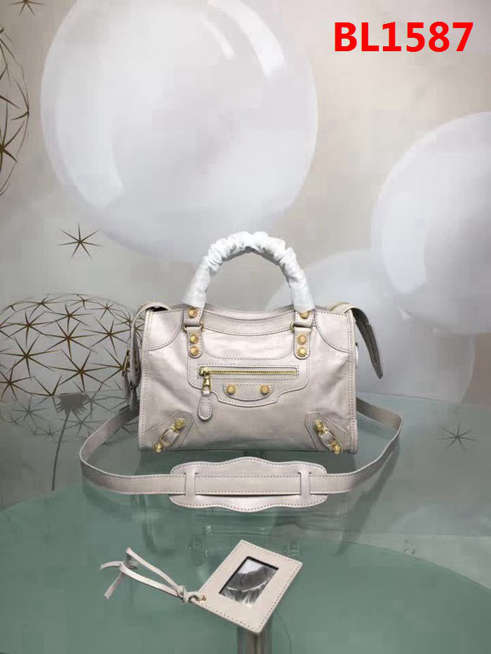 BALENCIAG巴黎世家 義大利進口 原版油蠟頭層牛皮 香皮小銀釘 時尚百搭 手提肩背斜挎包  BL1587