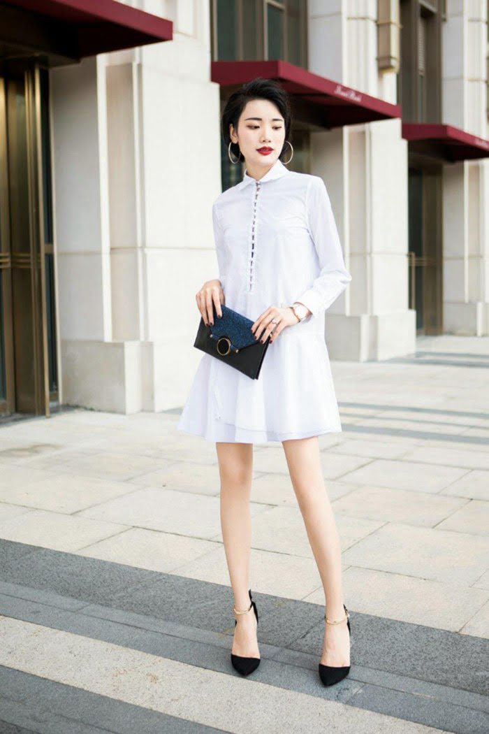 Chanel香奈兒 法國專櫃同步新款 2019早春新款 氣質翻領 重工盤扣 寬鬆大擺 襯裙連衣裙  xly1123